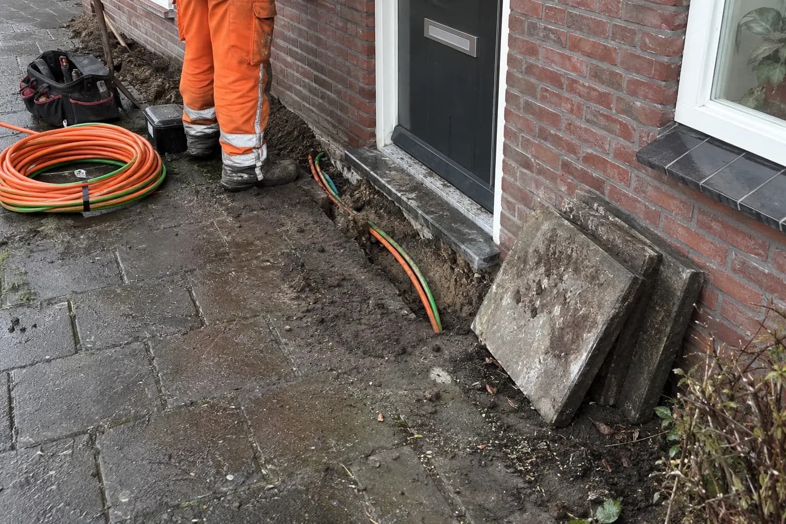 Aansluitleidingen voor water en gas tussen de straat en een woning